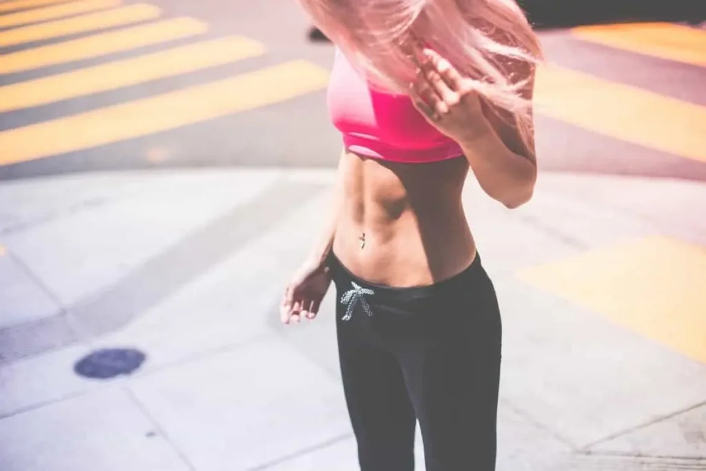 Woman with toned stomach after LA-EMS Body Sculpting Treatment Barking